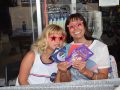 Author Lisa Rose displays her newest"Star Power"  series  and daughter Victoria