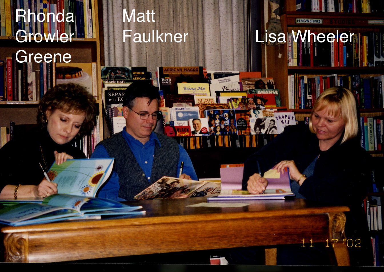 Rhonda Growler Greene, Matt Faulkner and Lisa Wheeler signing