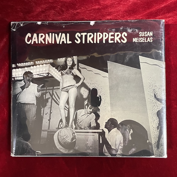 Carnival Strippers by Susan Meiselas (first edition)